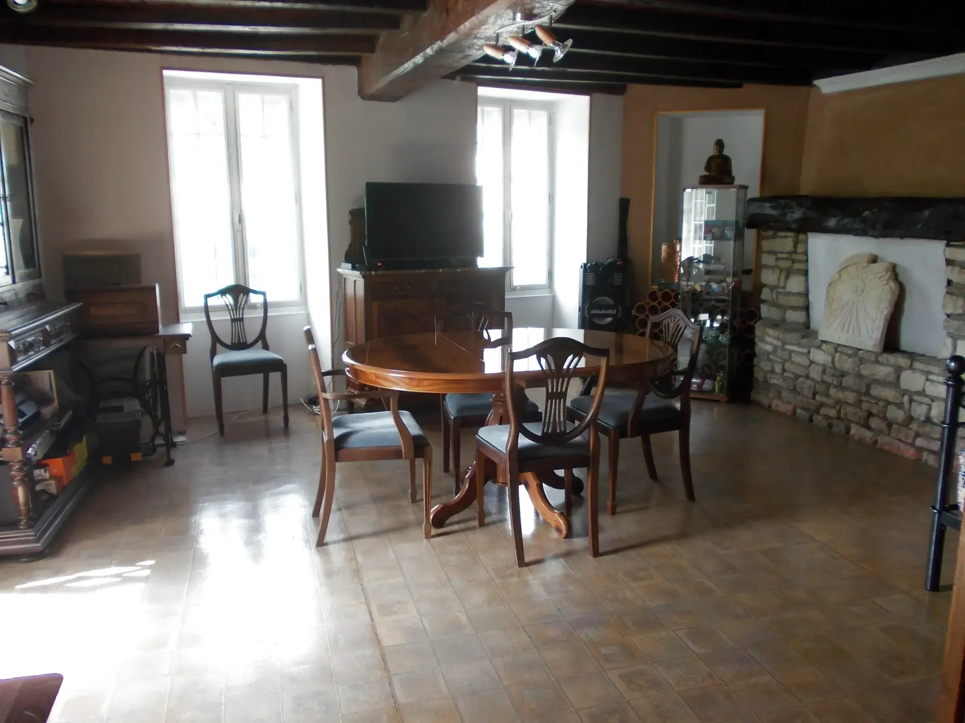 Maison de village rénovée avec garage à Matha - 117 m² 