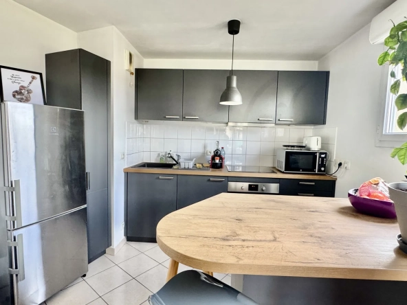 Appartement 3 pièces lumineux avec balcon, parking et cave à Poissy 