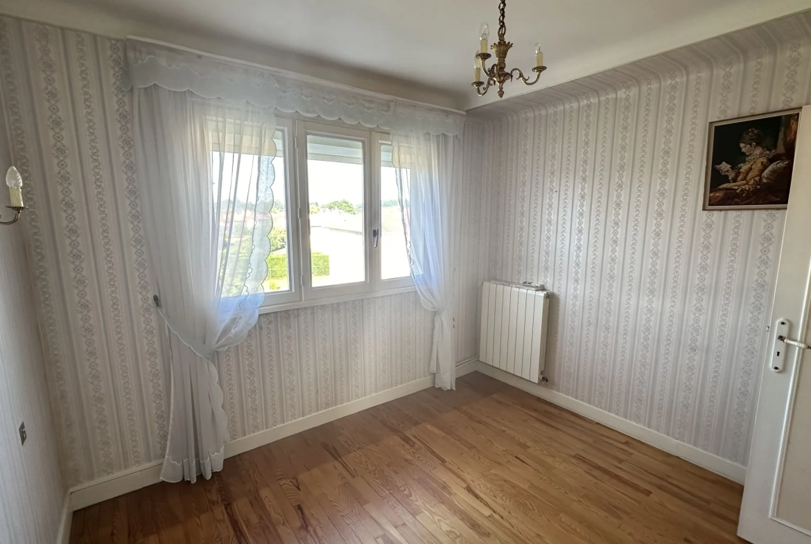 Maison familiale à Oloron-Sainte-Marie avec jardin, garage et 3 chambres 