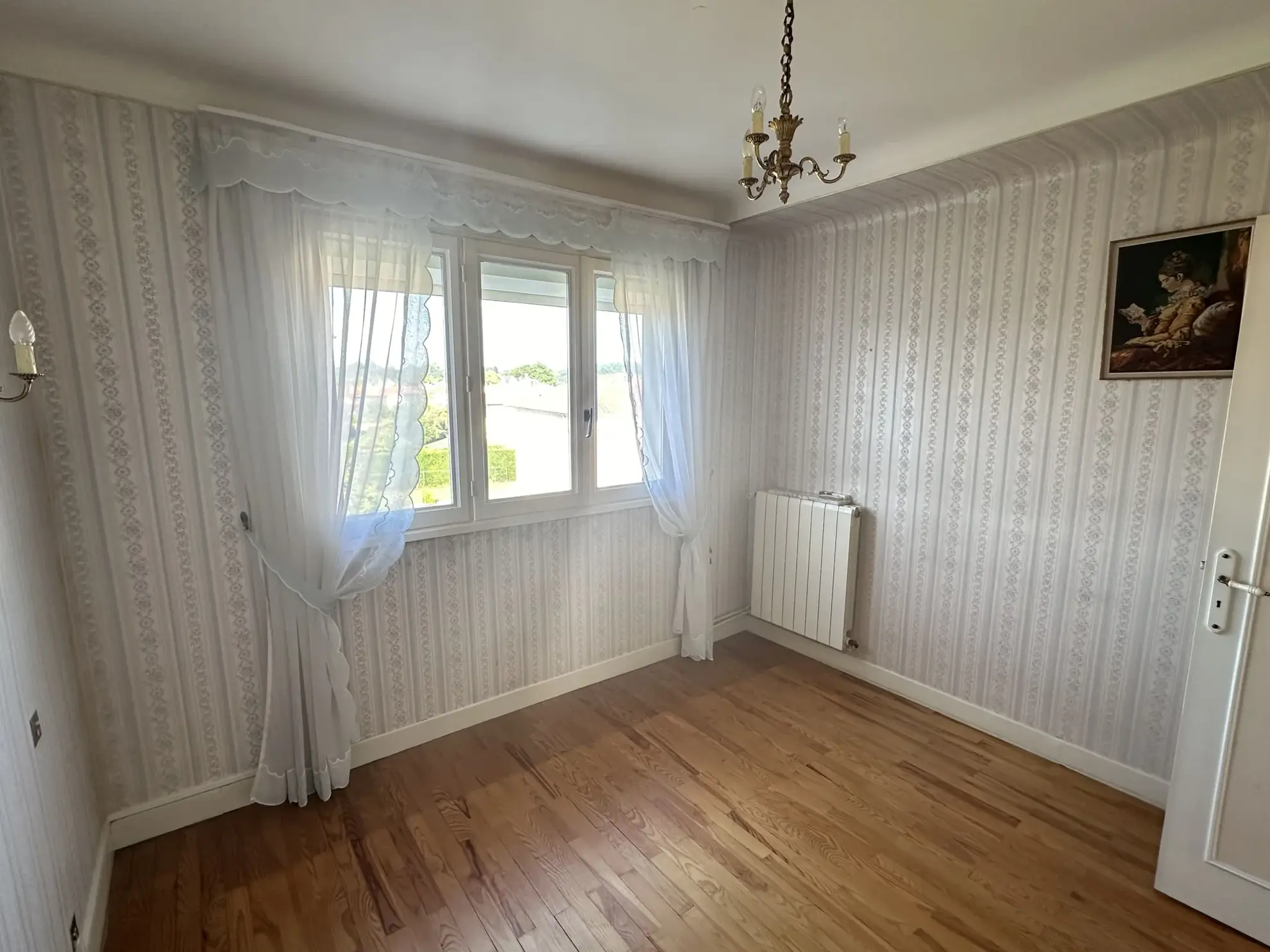 Maison familiale à Oloron-Sainte-Marie avec jardin, garage et 3 chambres 