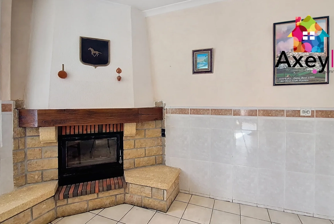 Maison familiale 4 chambres avec jardin et garage à Pouilly-sous-Charlieu 