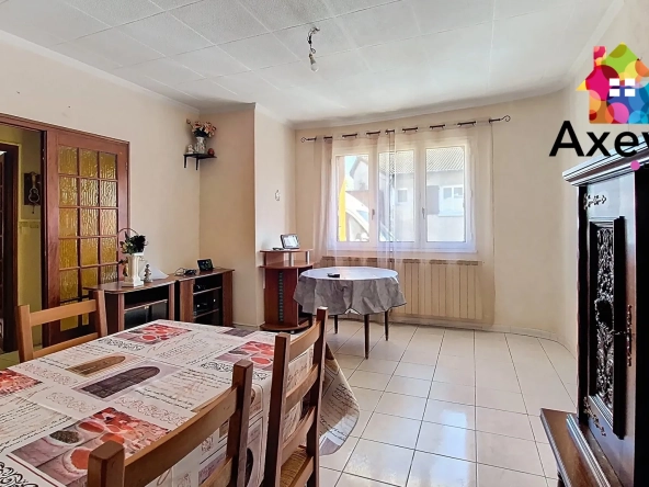 Maison familiale 4 chambres avec jardin et garage à Pouilly-sous-Charlieu