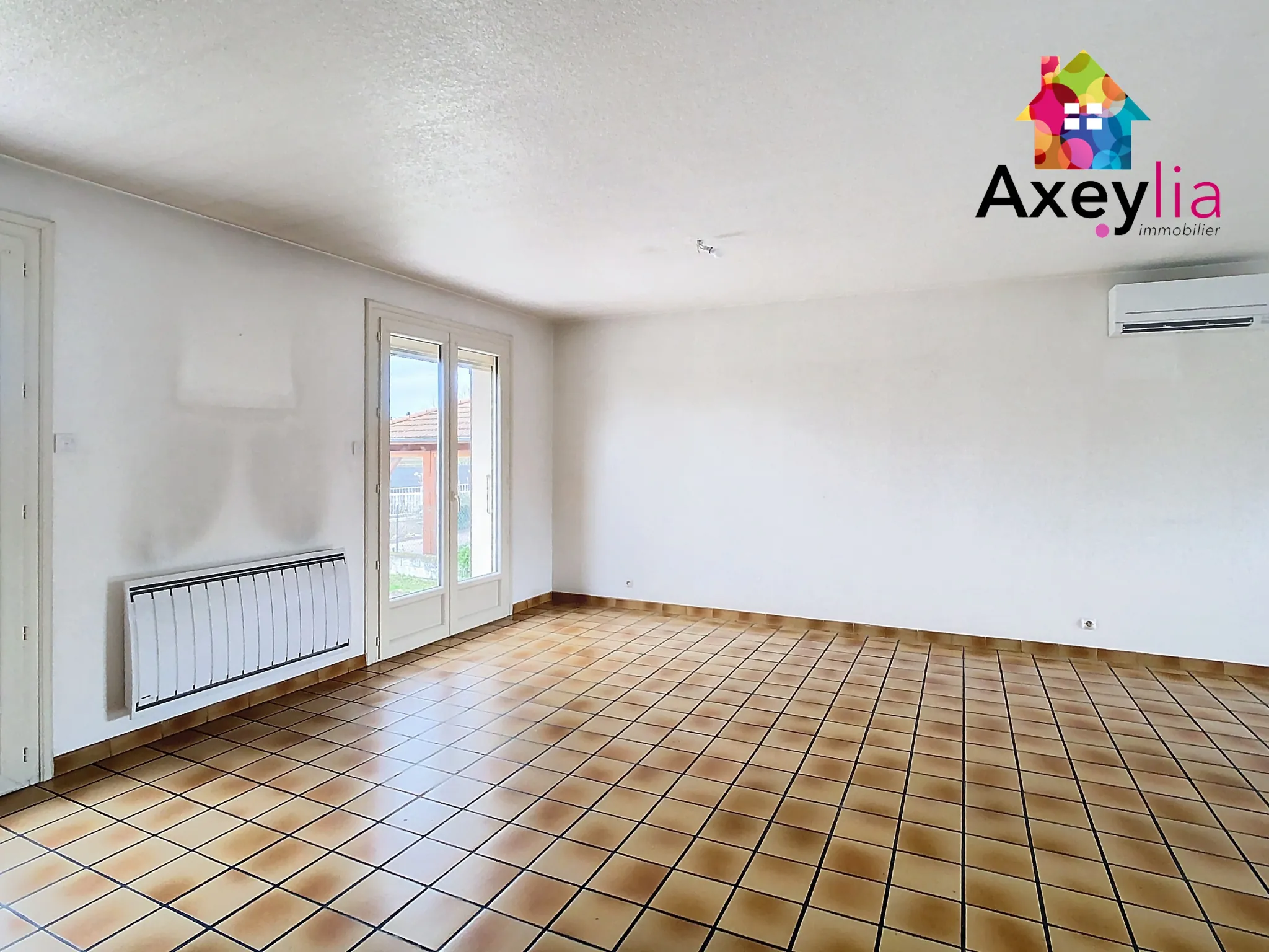 Belle maison avec 3 chambres, garage et terrain constructible à Saint-Romain-la-Motte 