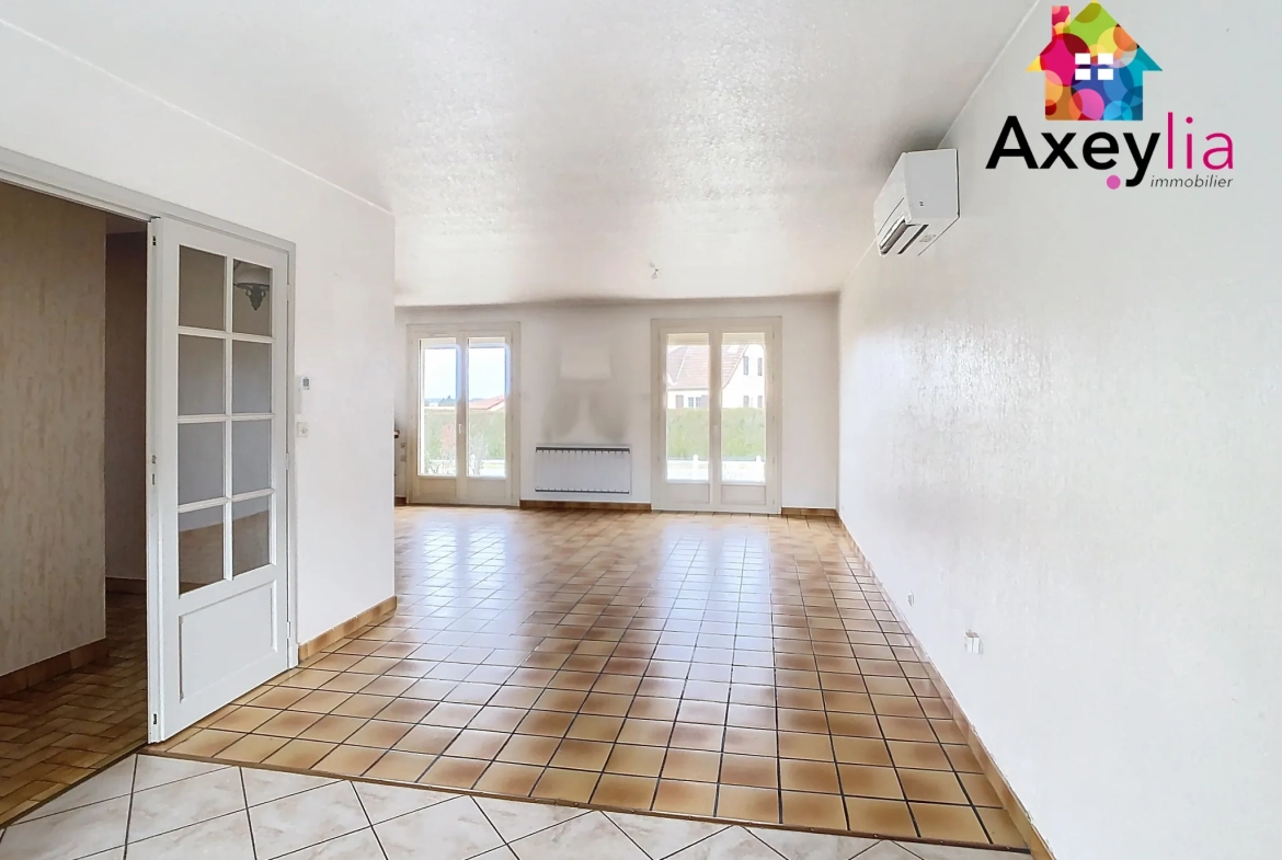 Belle maison avec 3 chambres, garage et terrain constructible à Saint-Romain-la-Motte 
