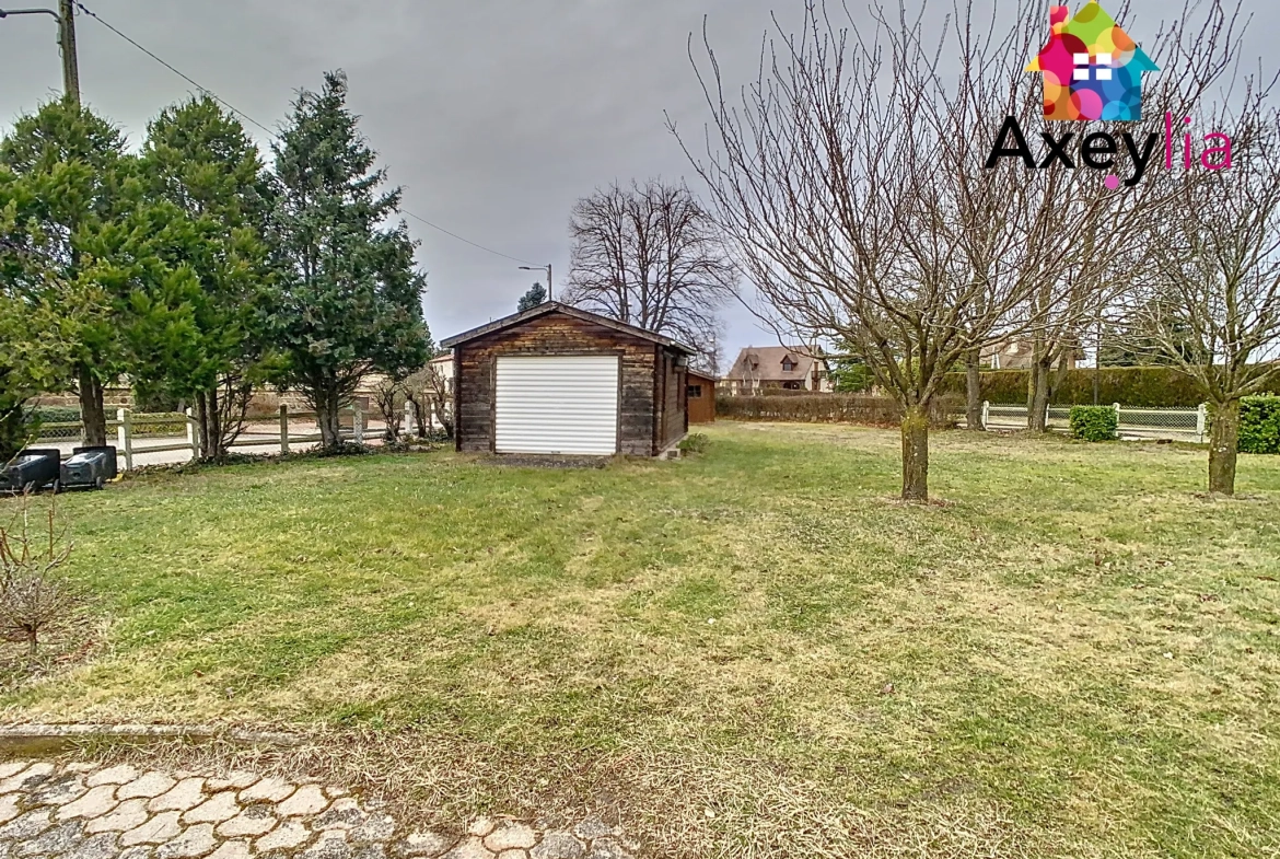 Belle maison avec 3 chambres, garage et terrain constructible à Saint-Romain-la-Motte 