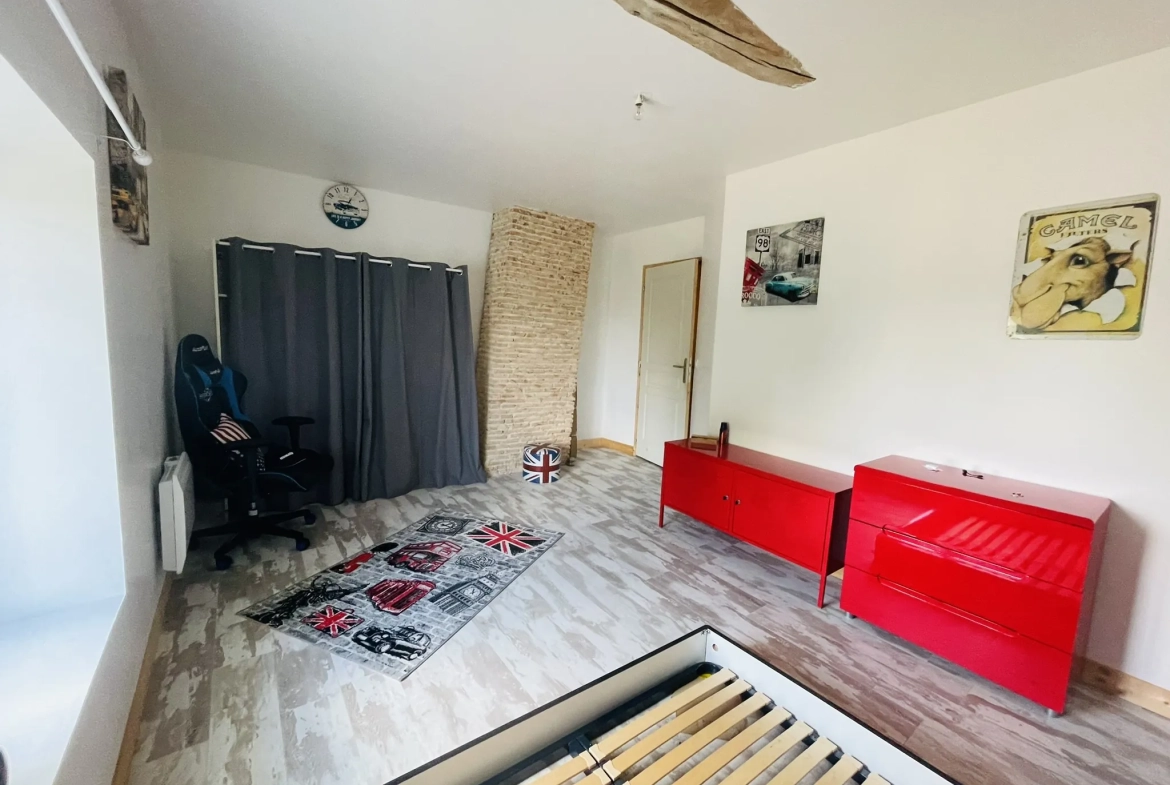 Belle maison familiale avec grand terrain à Cuhon, calme et potentielle extension 