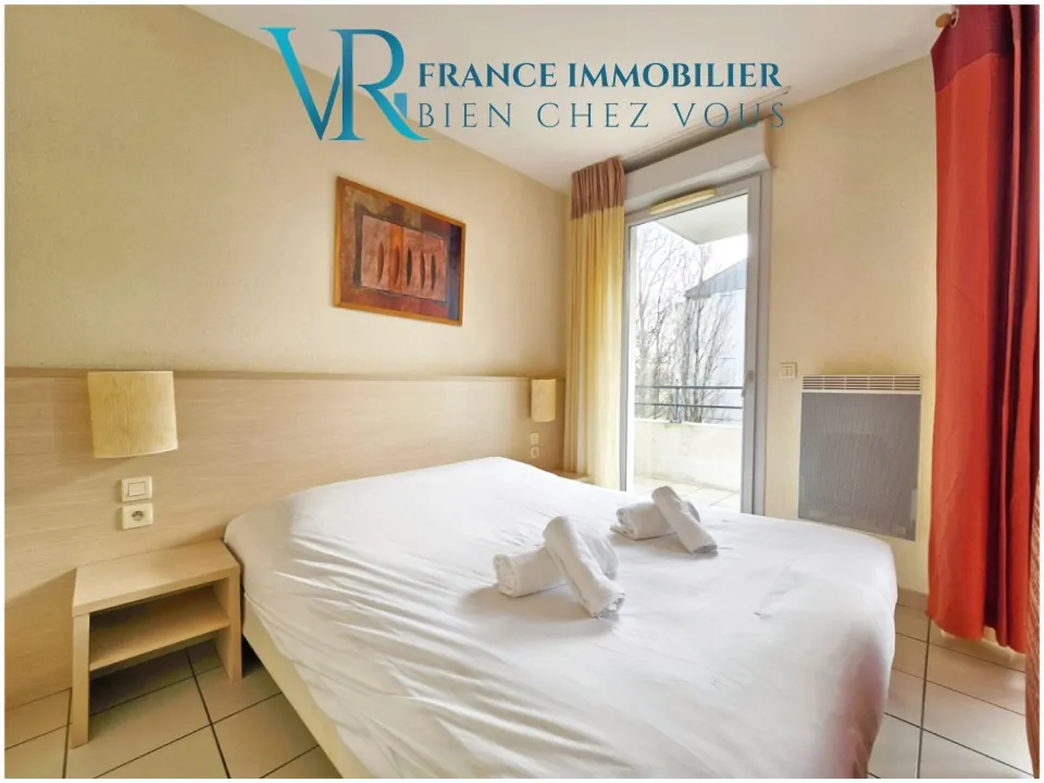 Studio de 31 m² avec balcon et parking à Divonne-les-Bains, idéal pour investisseurs 