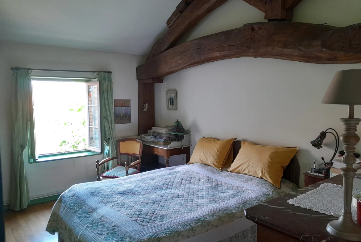 Maison de village authentique avec jardin, gîte et potentiel locatif à Malause 