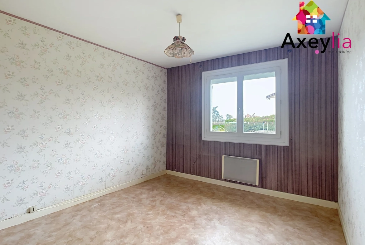 Maison de plain-pied à vendre à Briennon avec garage et jardin 