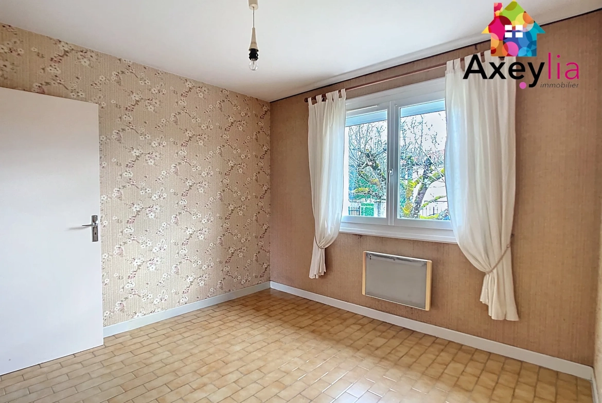 Maison de plain-pied à vendre à Briennon avec garage et jardin 