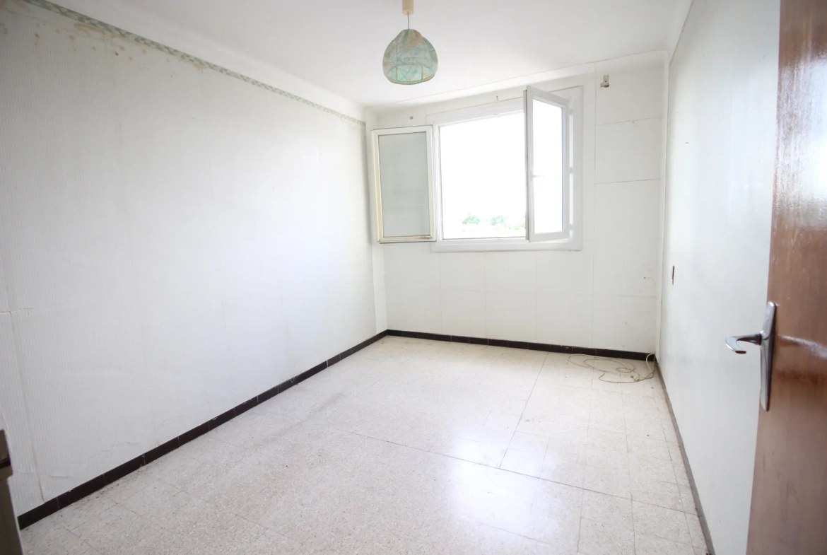 Appartement T4 à Montpelier avec 2 chambres, balcon, cave en dernier étage 