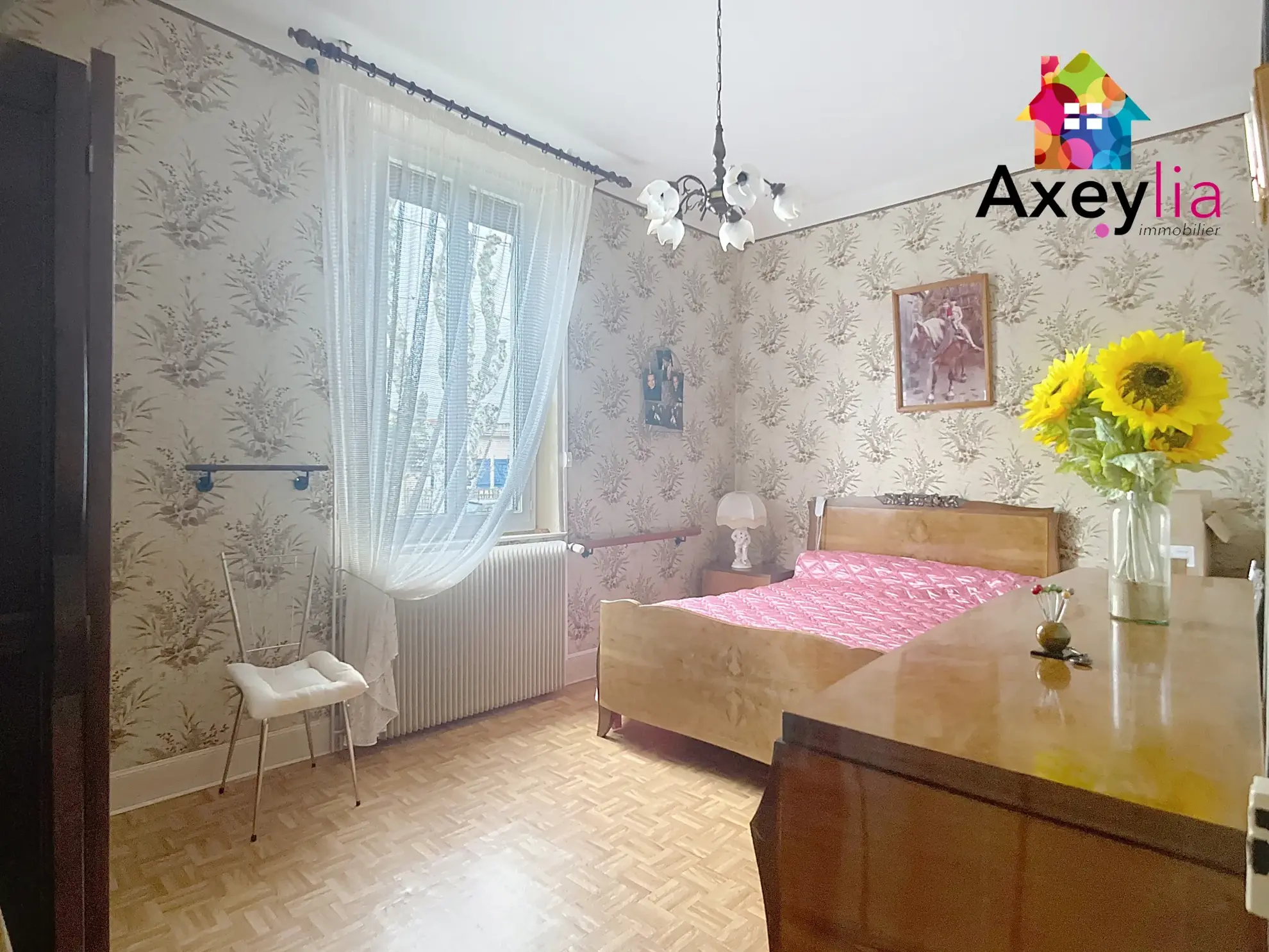 Maison à vendre à Roanne avec 2 chambres, garage et terrain clos de 312 m² 