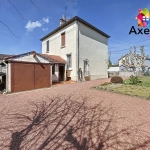 Maison à vendre à Roanne avec 2 chambres, garage et terrain clos de 312 m²
