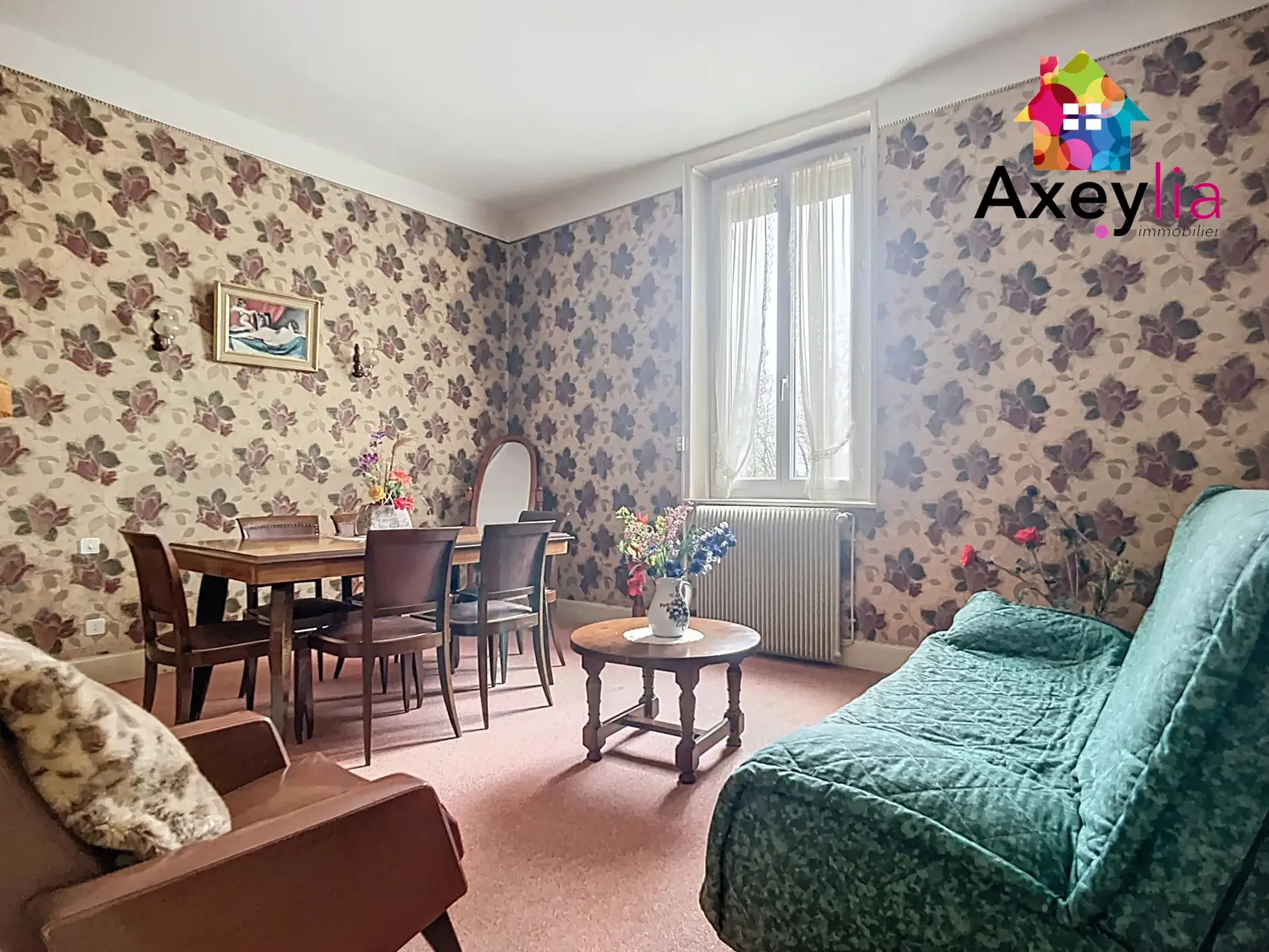 Maison à vendre à Roanne avec 2 chambres, garage et terrain clos de 312 m² 