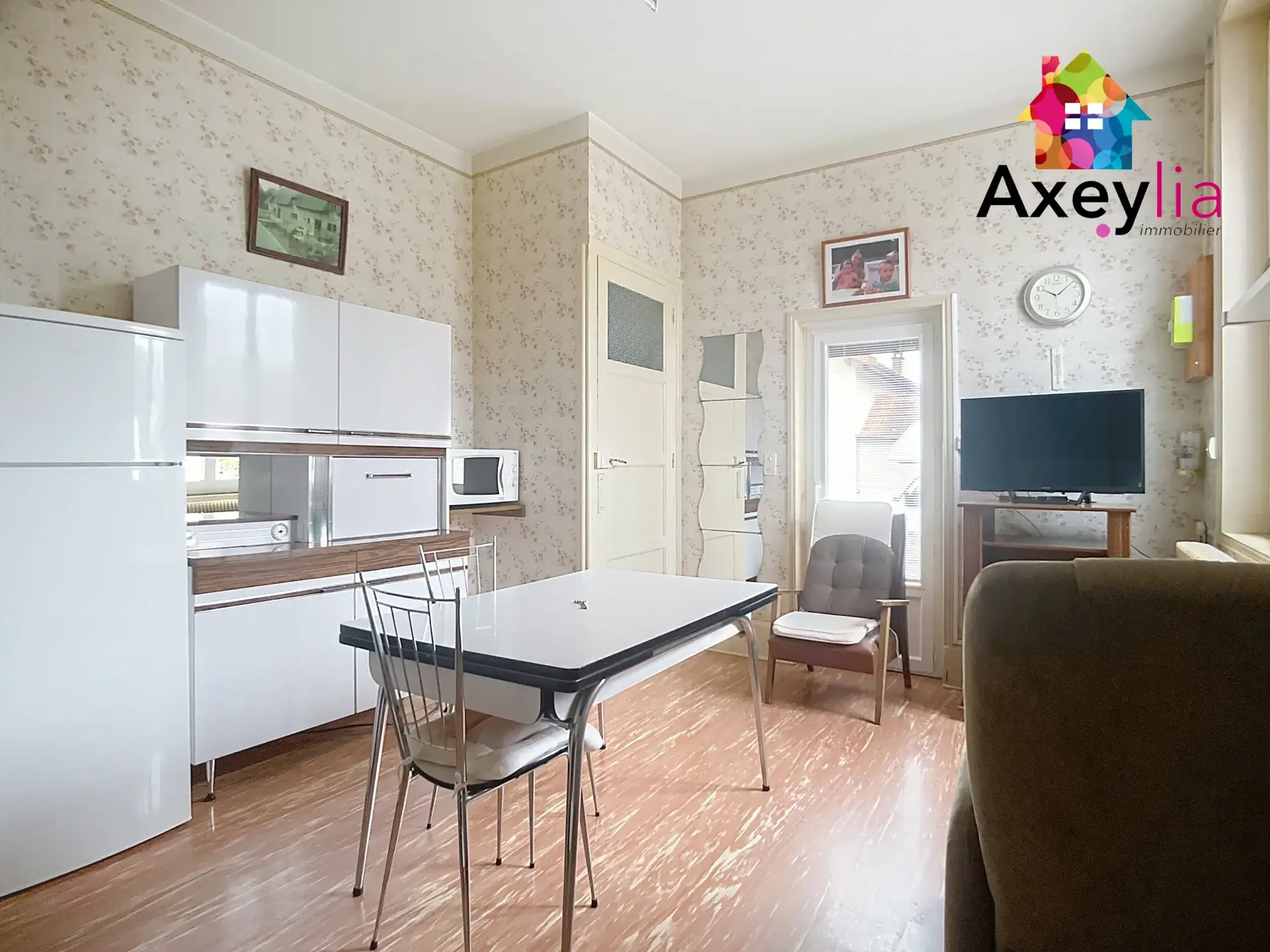 Maison à vendre à Roanne avec 2 chambres, garage et terrain clos de 312 m² 