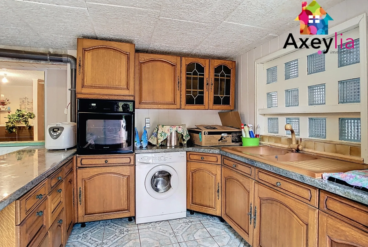 Maison familiale avec 5 chambres et grand garage à Digoin (71) 