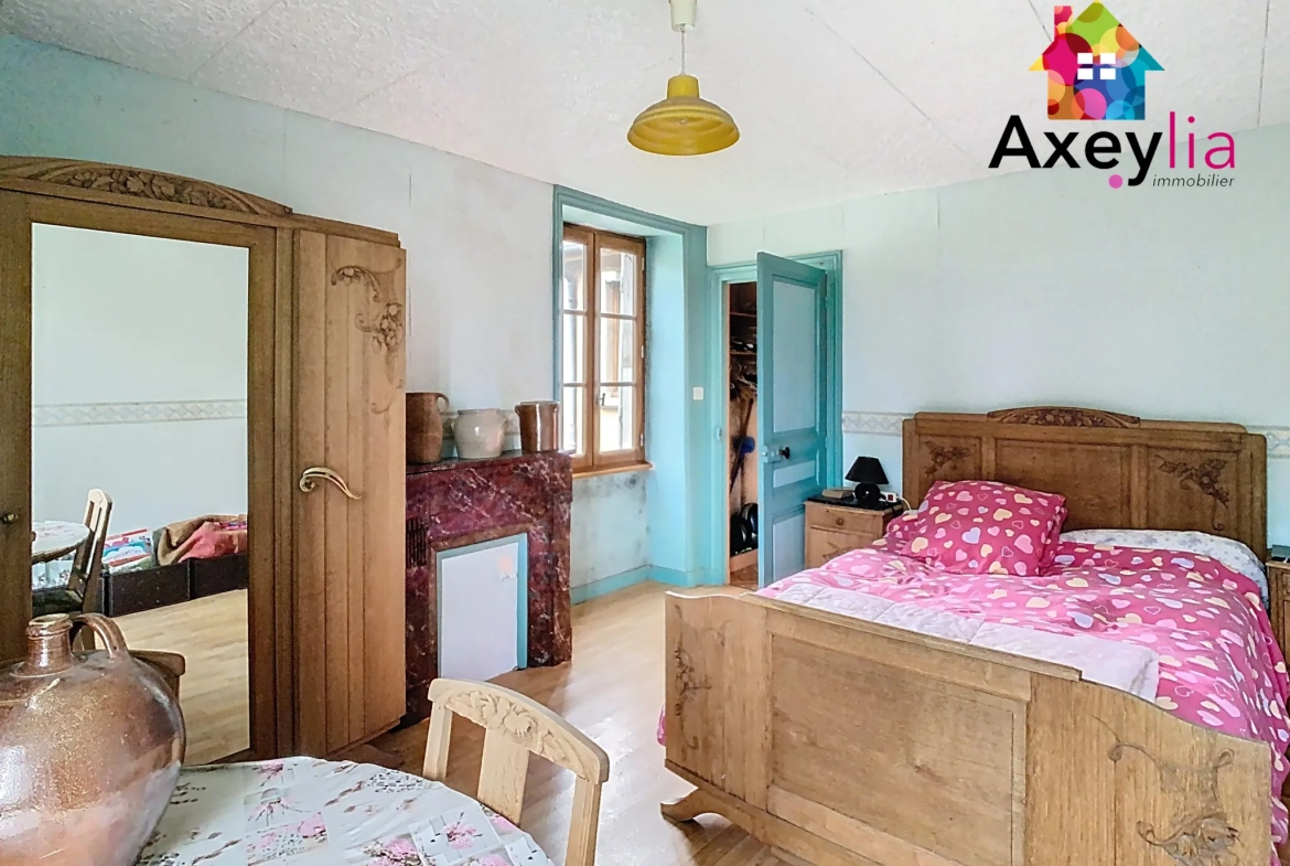 Maison en pierres à rénover au Crozet avec terrain de 3646 m² et dépendance 