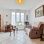 Appartement T3 récent avec balcon et garage à Bourgoin-Jallieu, 65m², idéalement situé