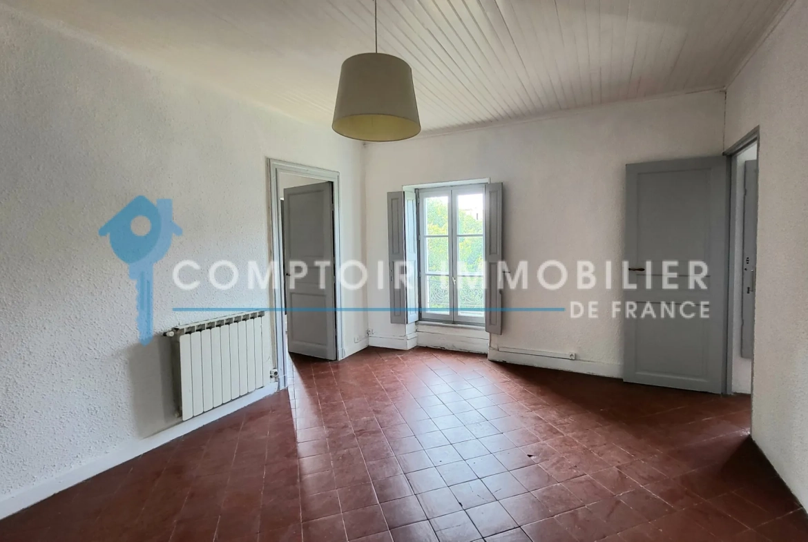 Appartement T3 de 79m² à Nîmes avec balcon et vue sur les toits - Idéalement situé 
