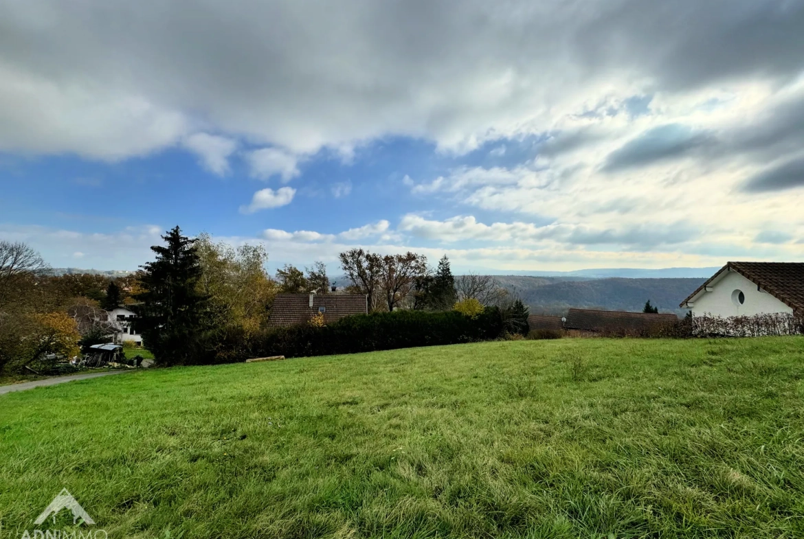 Terrain constructible de 1434 m² avec vue dégagée à Pougny 