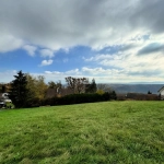 Terrain constructible de 1434 m² avec vue dégagée à Pougny