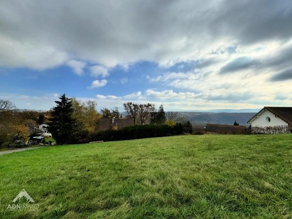 Terrain constructible de 1434 m² avec vue dégagée à Pougny
