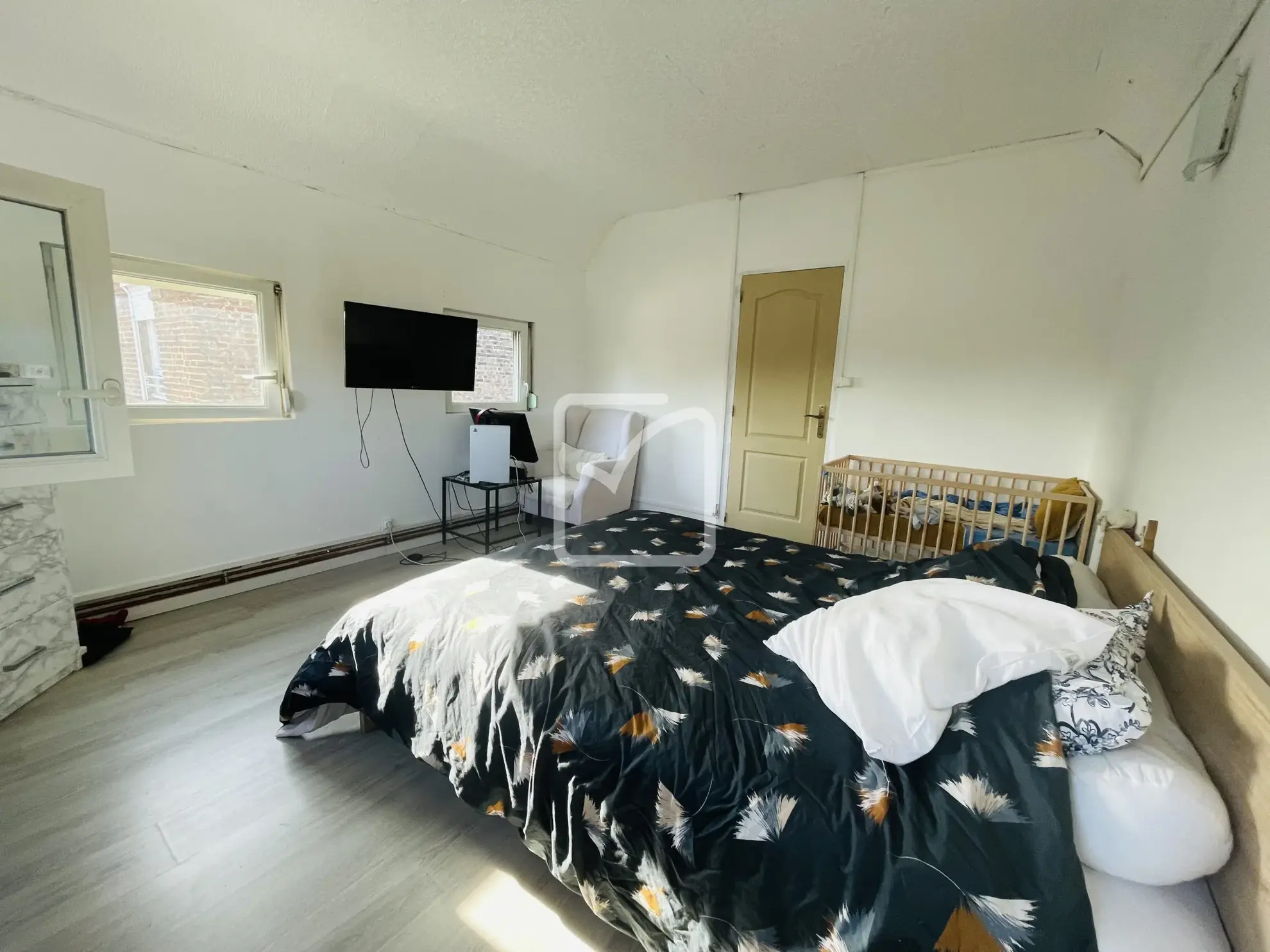 Maison semi-mitoyenne de 68 m² à Feignies avec terrain et stationnement 