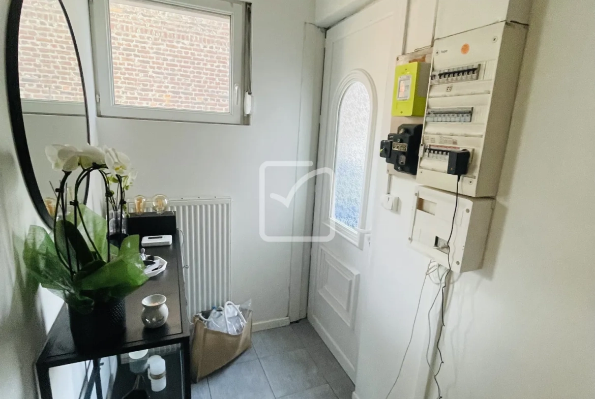Maison semi-mitoyenne de 68 m² à Feignies avec terrain et stationnement 