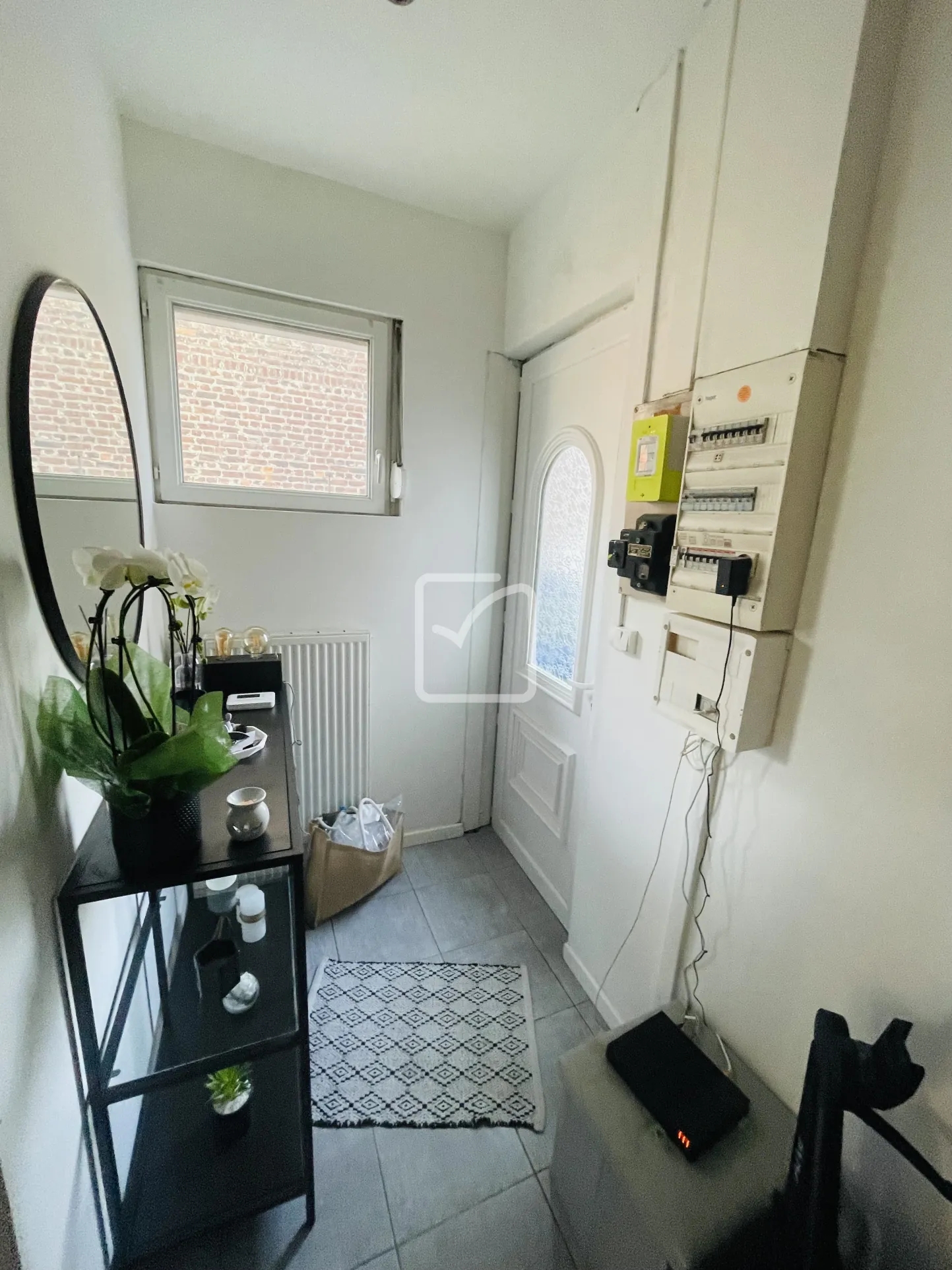 Maison semi-mitoyenne de 68 m² à Feignies avec terrain et stationnement 