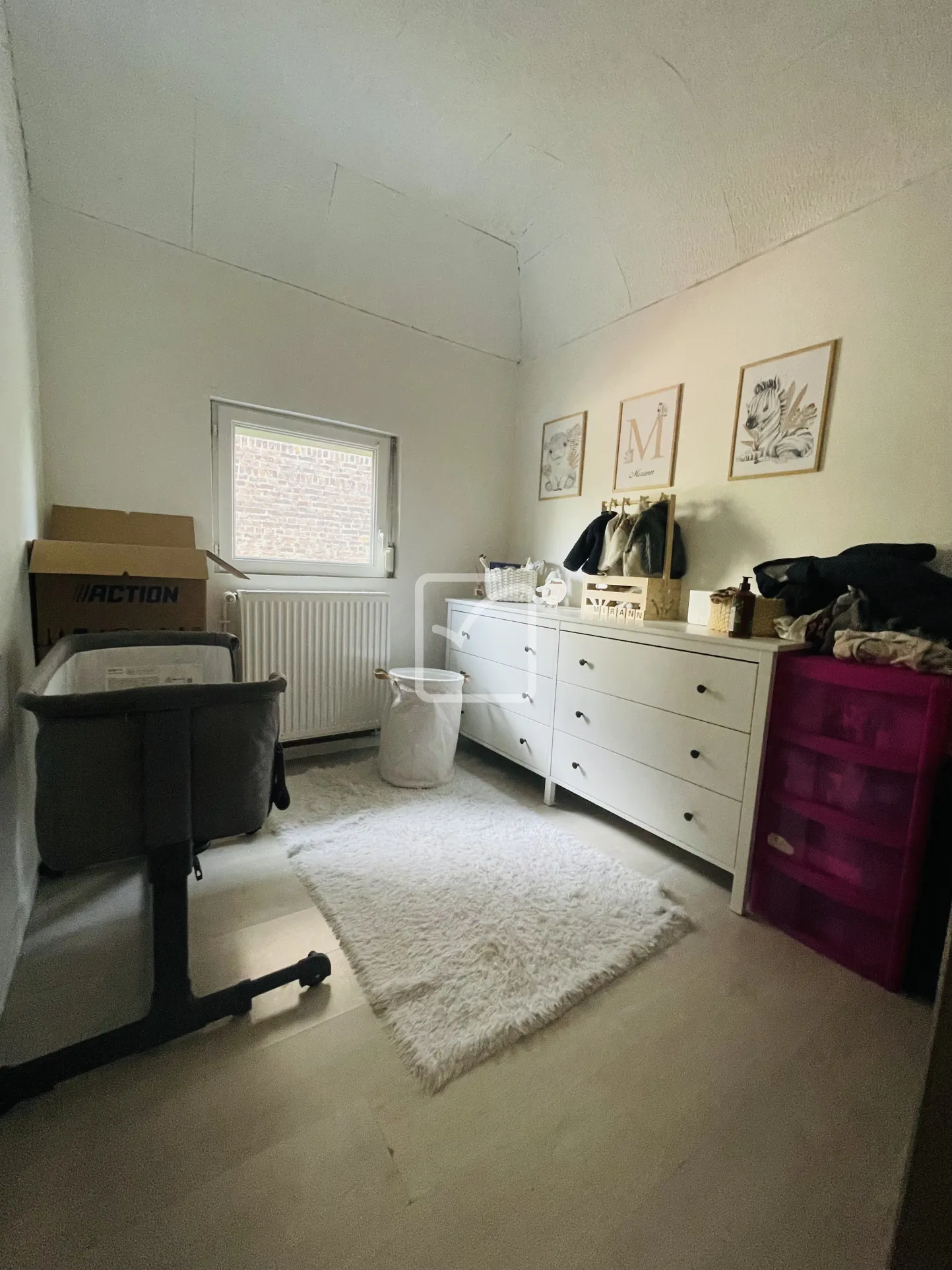 Maison semi-mitoyenne de 68 m² à Feignies avec terrain et stationnement 