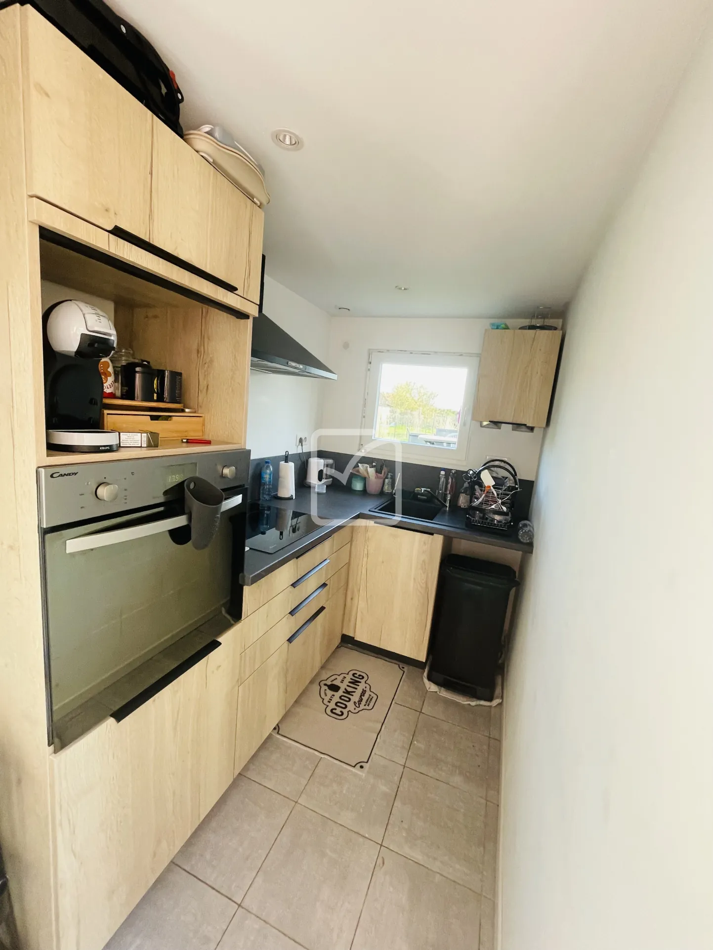 Maison semi-mitoyenne de 68 m² à Feignies avec terrain et stationnement 