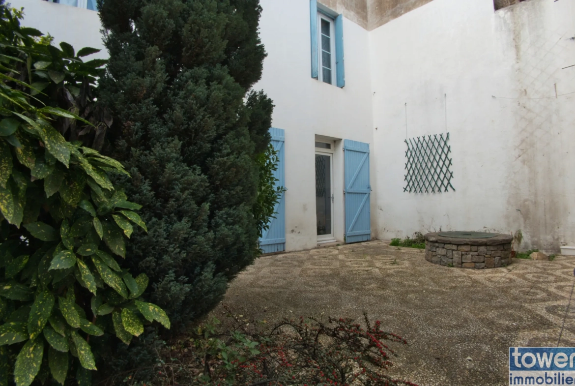 Belle maison de ville à Lézignan-Corbières avec garage et patio, idéal investissement ou résidence principale 
