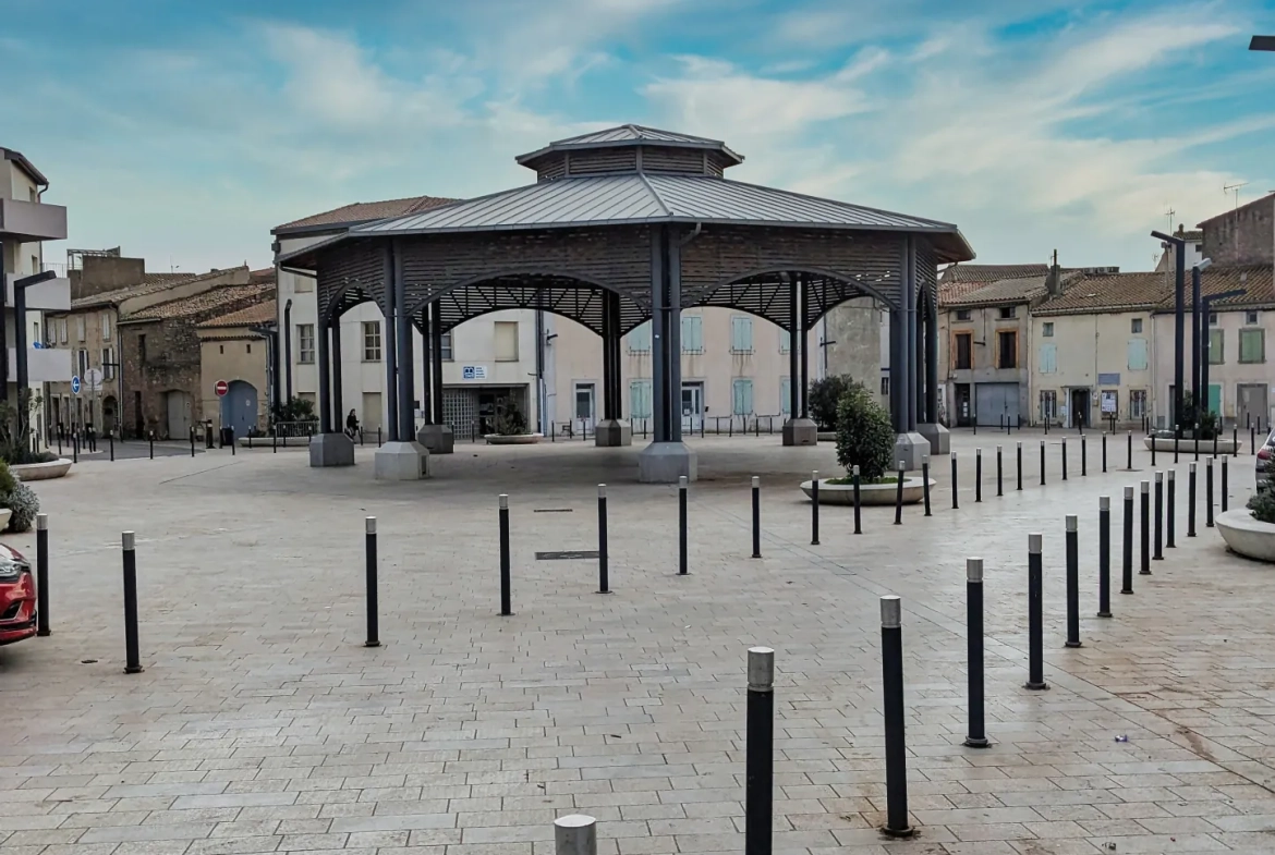 Belle maison de ville à Lézignan-Corbières avec garage et patio, idéal investissement ou résidence principale 