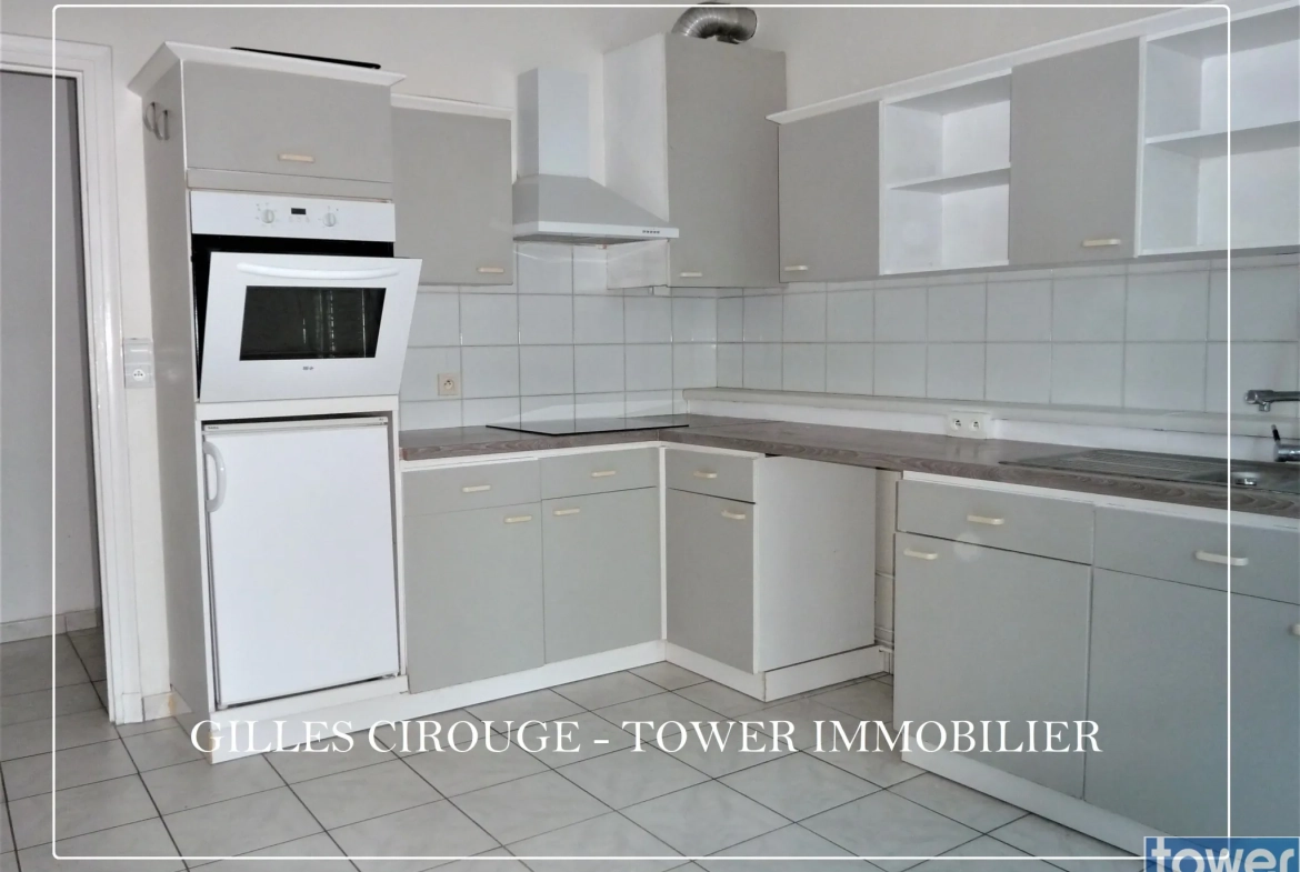 Appartement T5 lumineux de 110 m² au centre-ville de Lorient avec caves et parking 