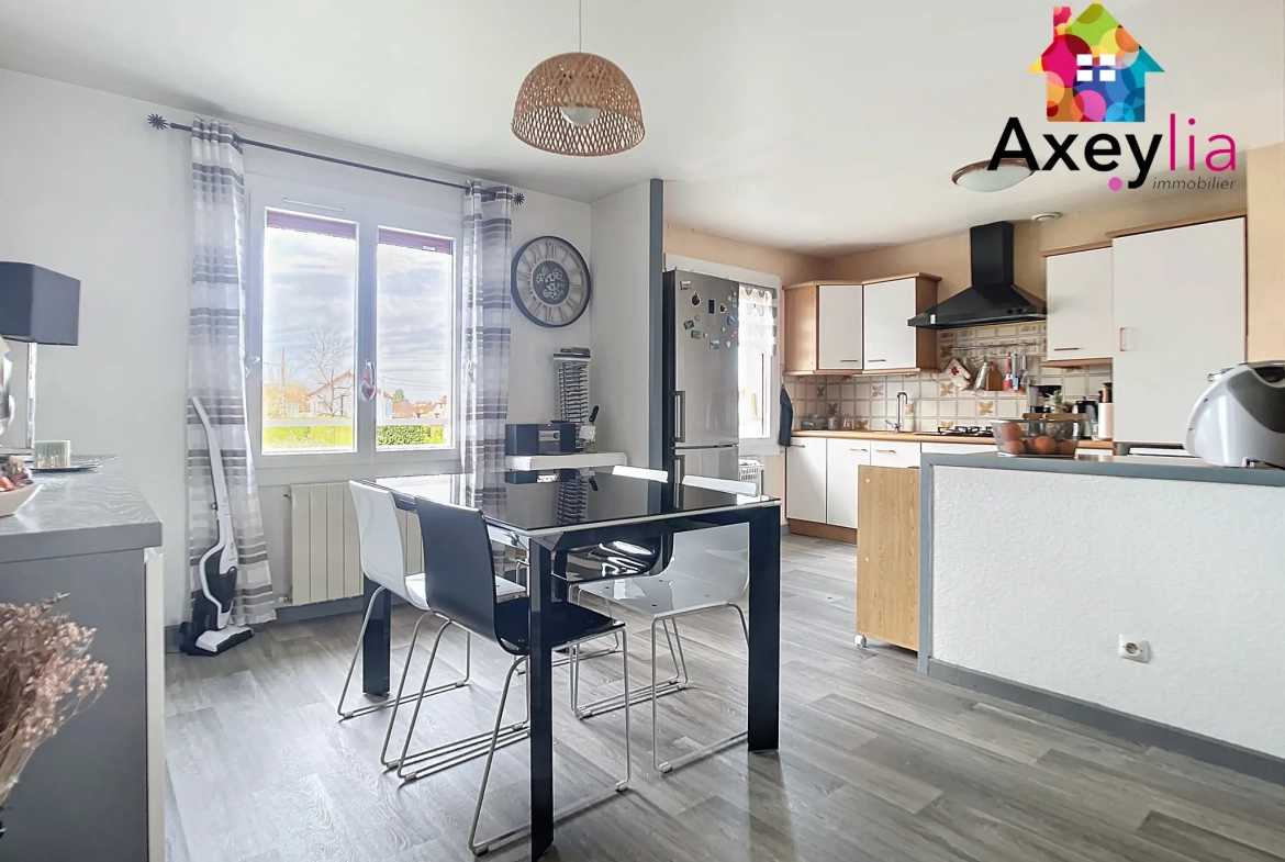 Maison rénovée avec 2 chambres, jardin et garage au Coteau 