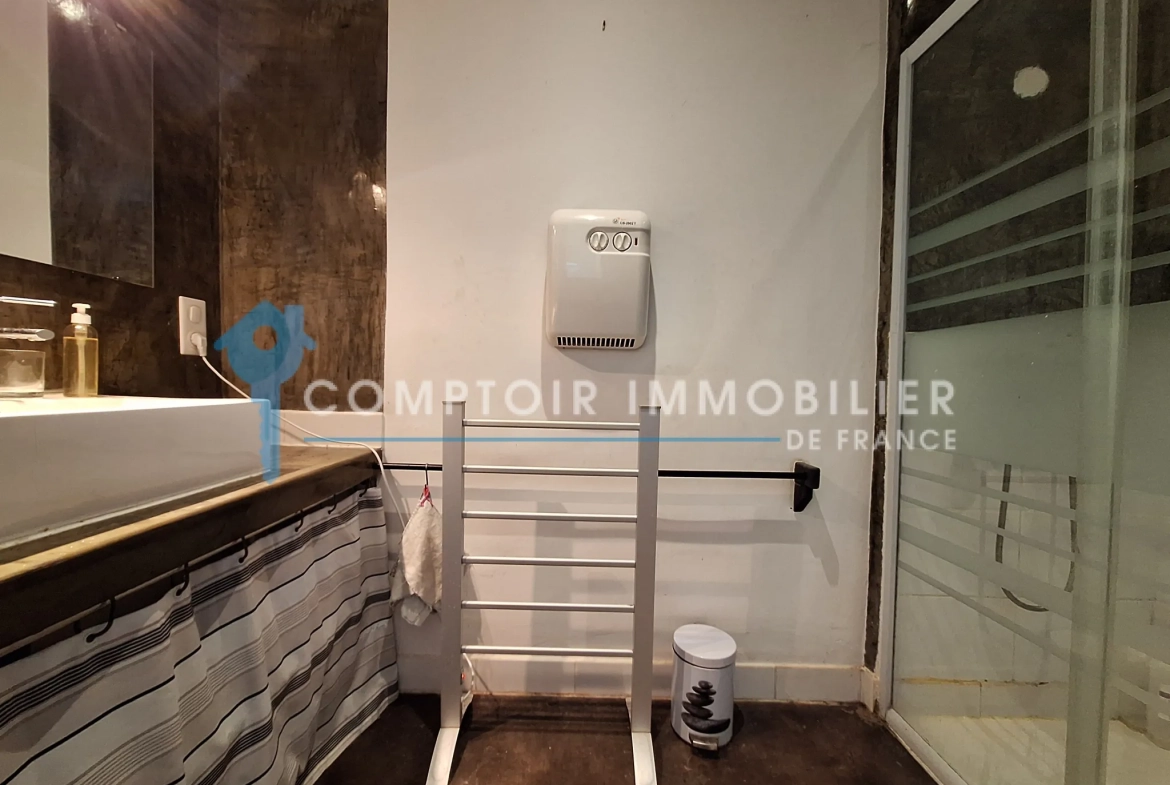 Investissement immobilier à Damiatte avec local commercial, appartement et garage 