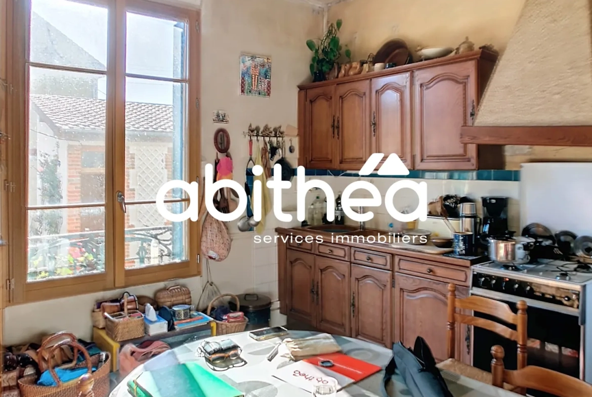 Maison ancienne à Troyes avec grand terrain et potentiel de rénovation 