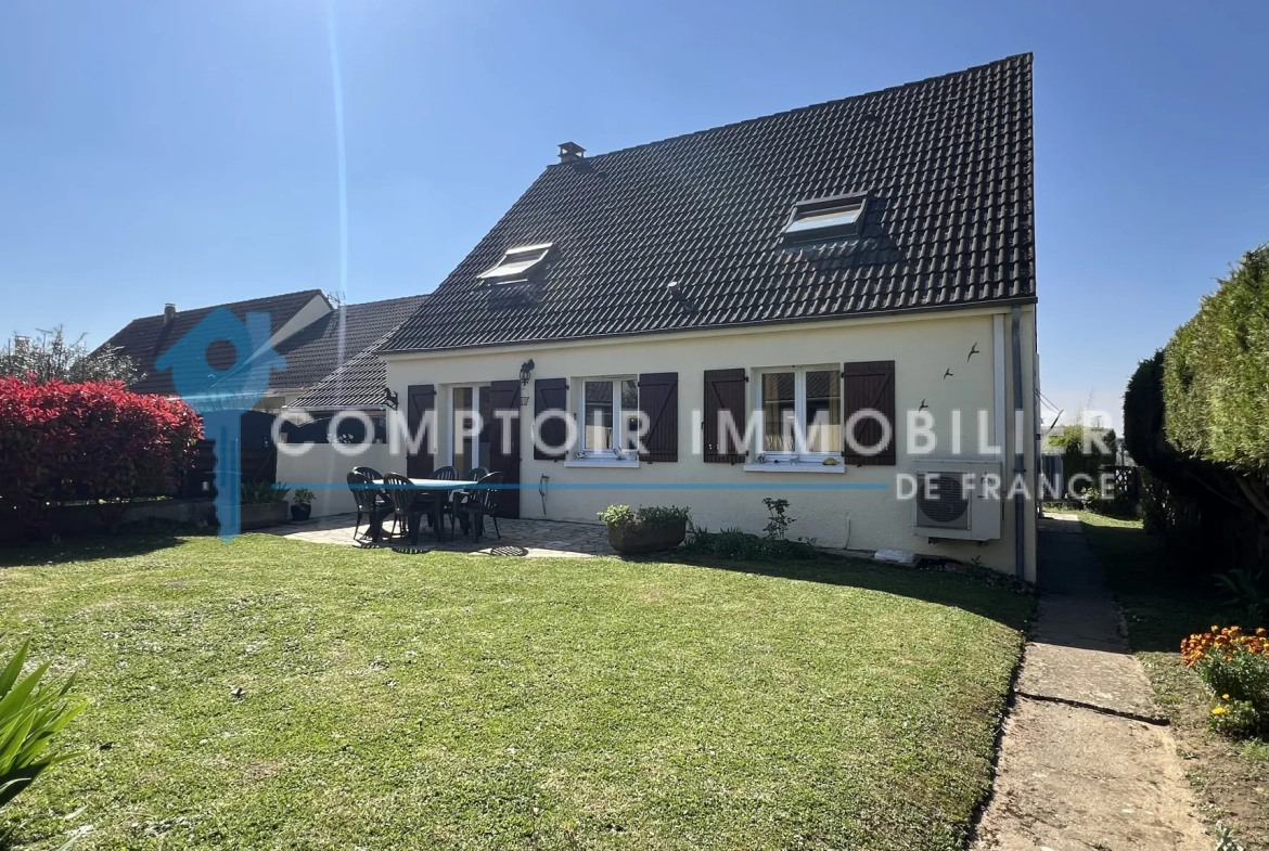 Maison familiale de plain-pied à La Ferté Alais avec garage et terrasse 