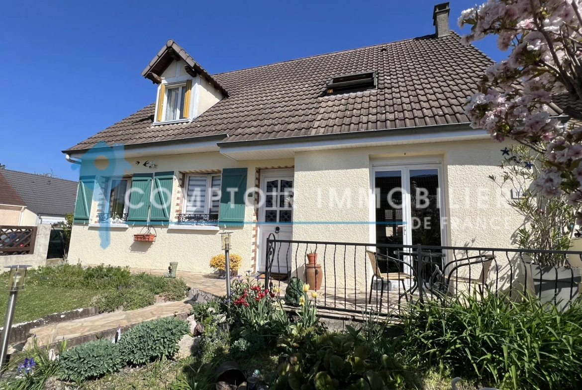 Maison familiale de plain-pied à La Ferté Alais avec garage et terrasse 