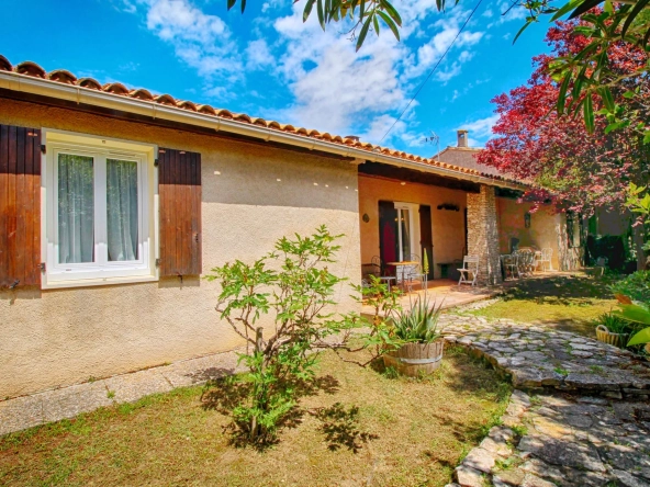 Belle maison à vendre à Carcassonne avec 4 chambres, garage et jardin 