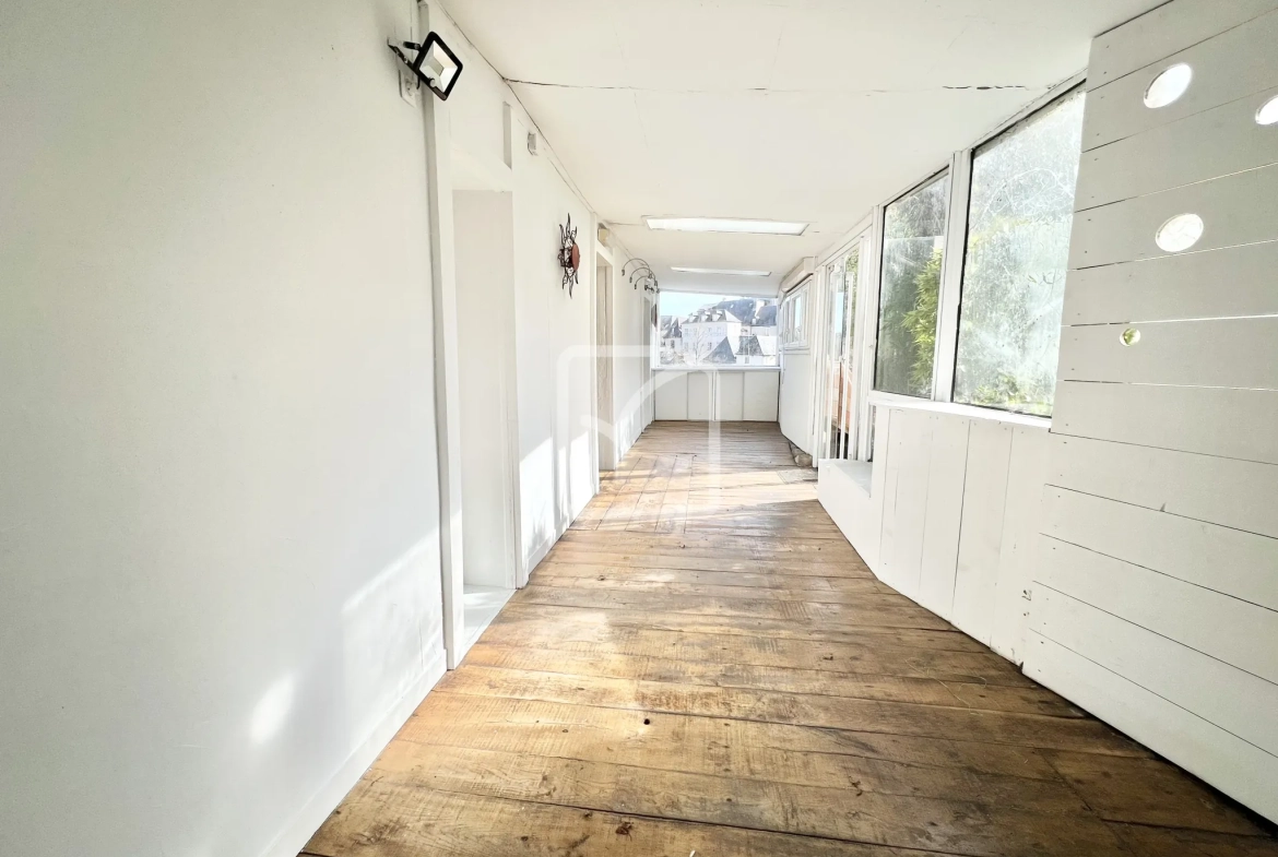 Charmante maison de 65 m² à Terrasson Lavilledieu avec véranda et espace de stockage 