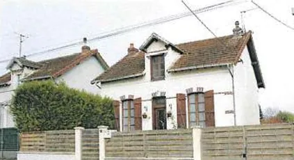 Maison à vendre à Migennes avec 2 chambres, garage et véranda à 32 000 euros 