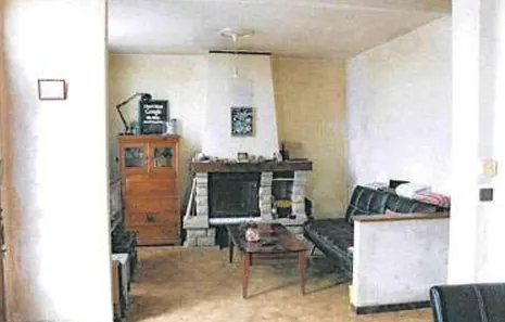 Maison à vendre à Migennes avec 2 chambres, garage et véranda à 32 000 euros 