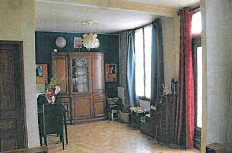 Maison à vendre à Migennes avec 2 chambres, garage et véranda à 32 000 euros 