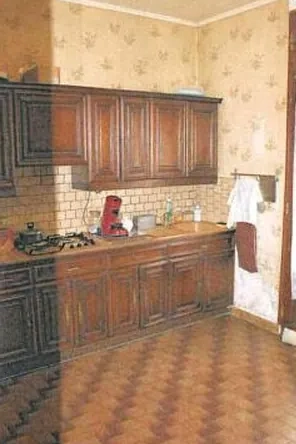 Maison à vendre à Migennes avec 2 chambres, garage et véranda à 32 000 euros 