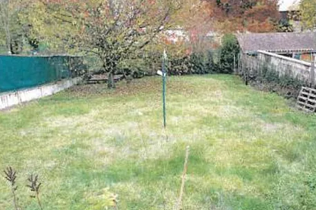 Maison à vendre à Migennes avec 2 chambres, garage et véranda à 32 000 euros 