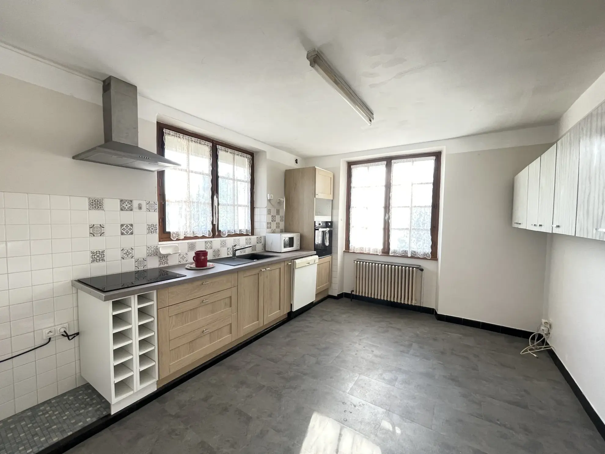 Maison familiale 7 pièces à Saint Privat avec jardin et garage 