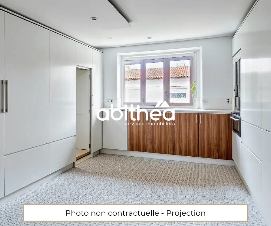 Appartement à rénover de 64m2 avec garage en hyper-centre de Saintes 