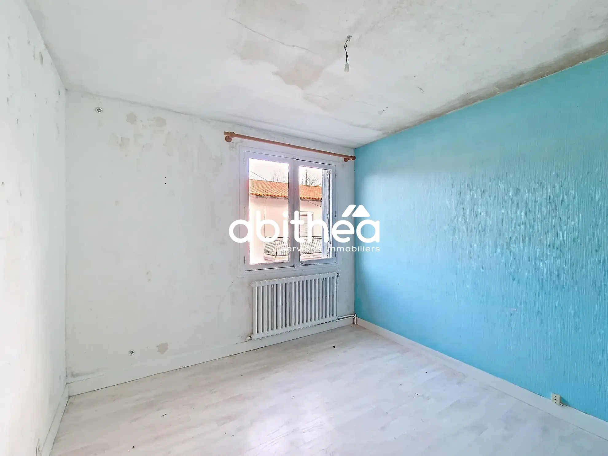 Appartement à rénover de 64m2 avec garage en hyper-centre de Saintes 