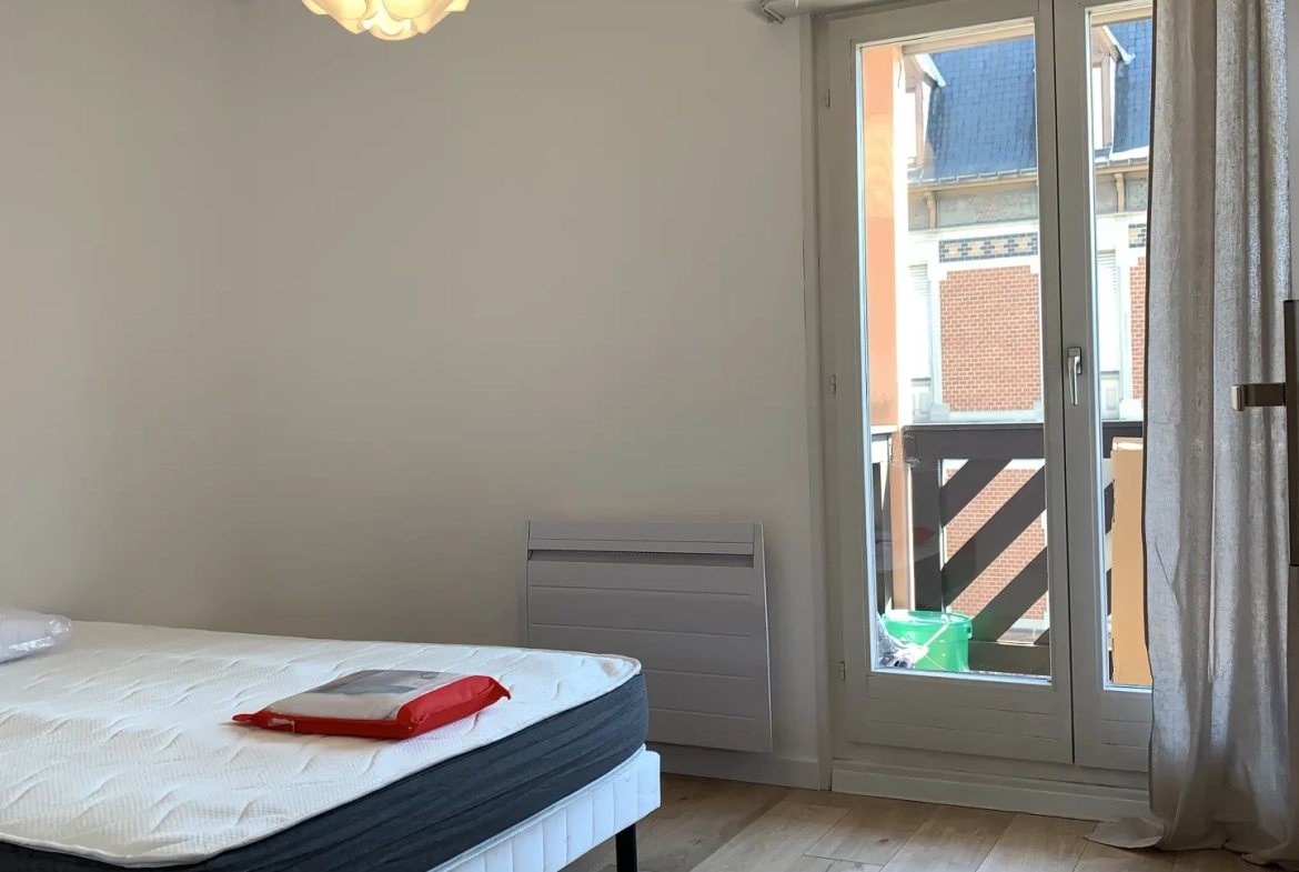 Appartement 3 pièces de 65 m² à Colmar avec balcon et garage en centre-ville 